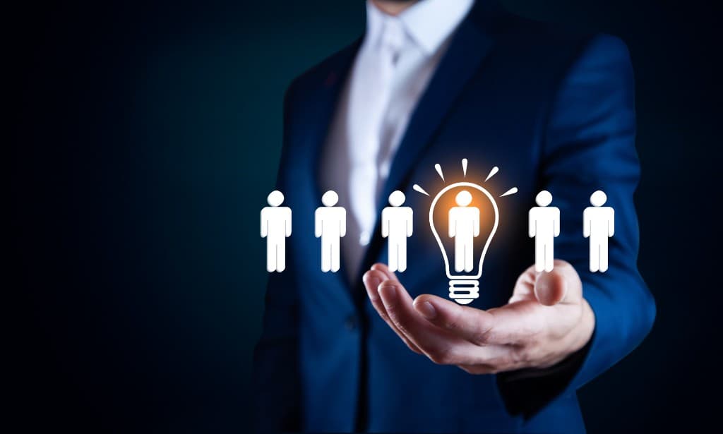 Business leader presenting a conceptual team and innovation graphic