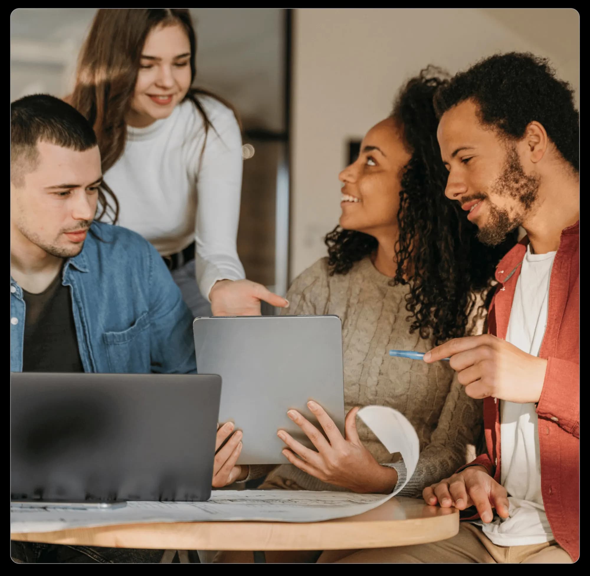MJB Technology team collaborating in the office